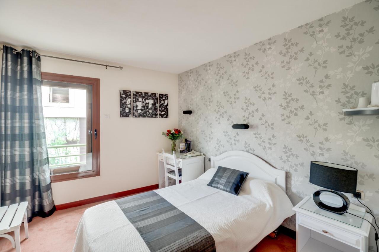Contact Hotel Limoges - Hotel Des Deux Moulins Экстерьер фото